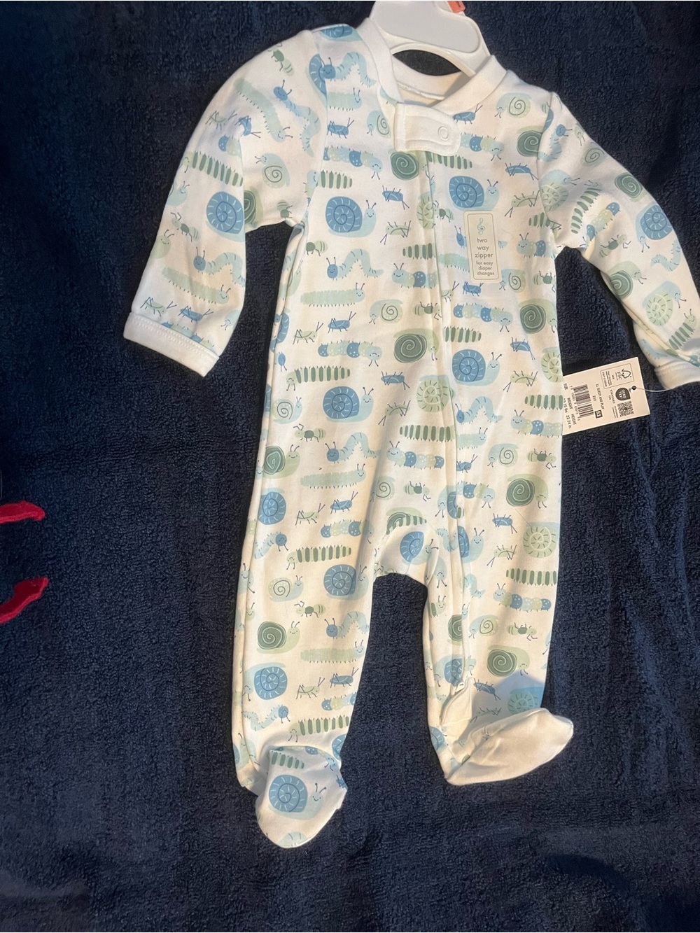 Baby Footed One-Piece in White with Blue & Green Animal Print